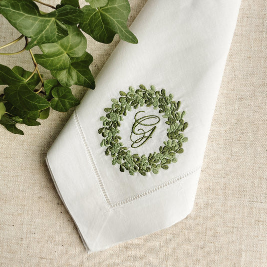 Dinner napkin with green wreath and monogram